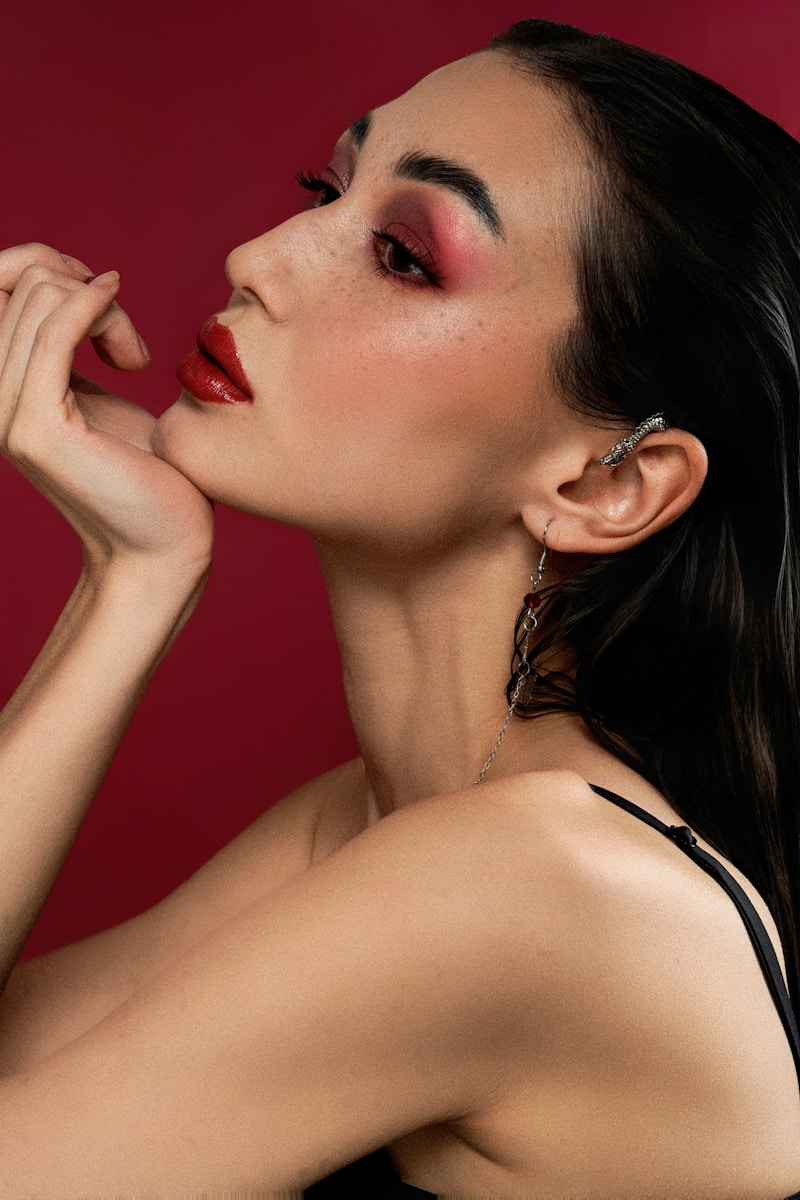 Woman with dramatic makeup and earring